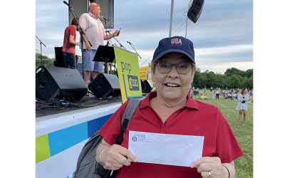 Resident Diana Kalassay splits pot in Rotary 50/50 Raffle